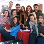 [en]: participants in a warm room