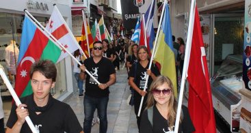 Volunteers with national flags