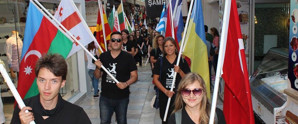 Volunteers with national flags